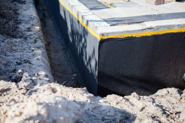 Professional Waterproofing technician working in Irwin, OH